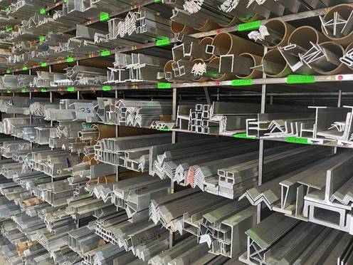 A shelf with metal pipes  AI-generated content may be incorrect.